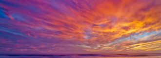 Pink clouds in the sky at sunset